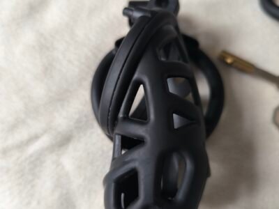 Cage chasteté quasi neuve
