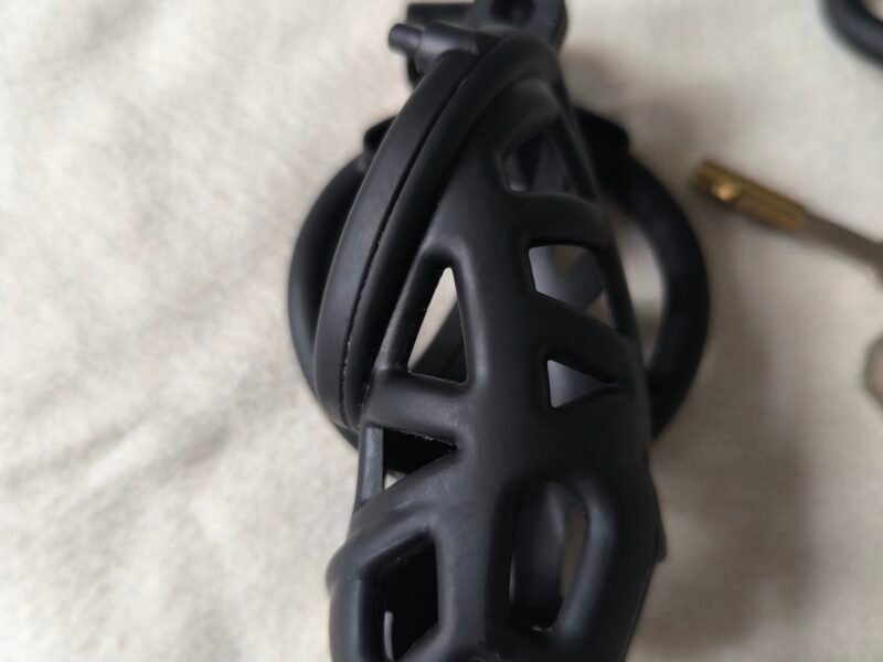 Cage chasteté quasi neuve